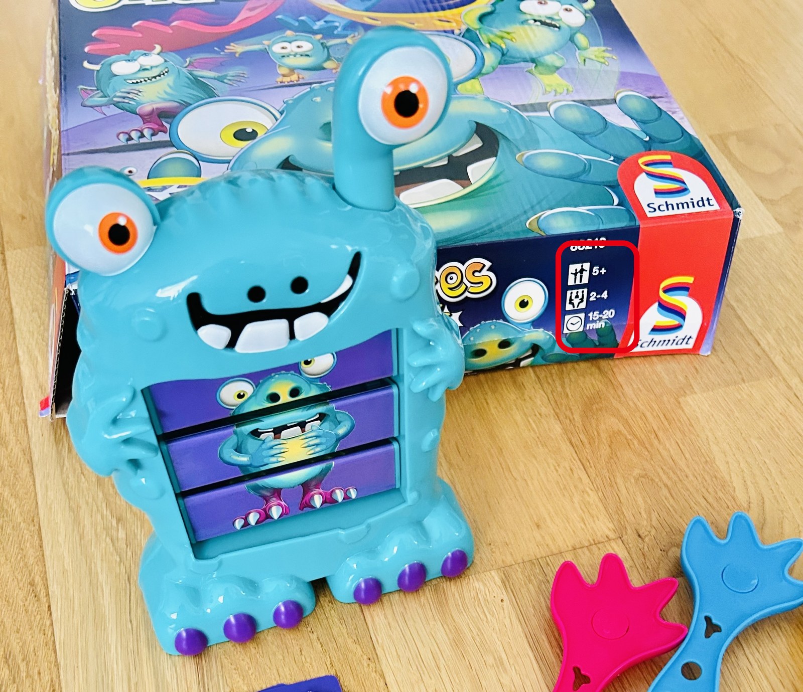 Schmidt 社のモンスターのゲームの箱の横の、対象年齢と人数のマーク